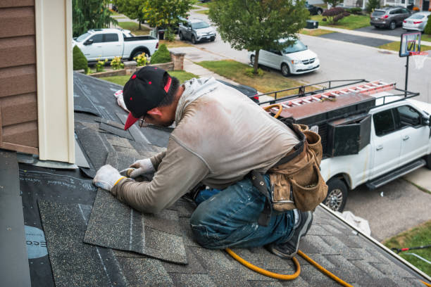 Professional Roofing technician working in Richford, VT
